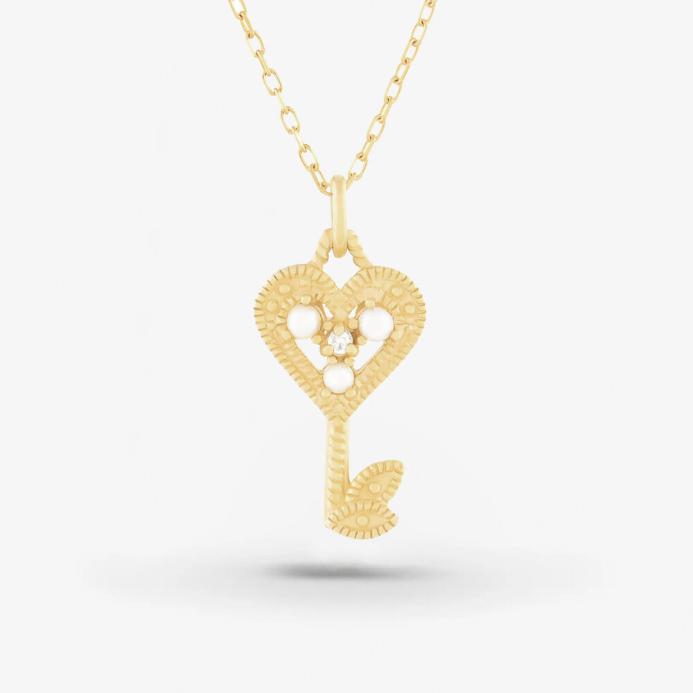 Photo de Collier Alma petite clé - or jaune 10 carats